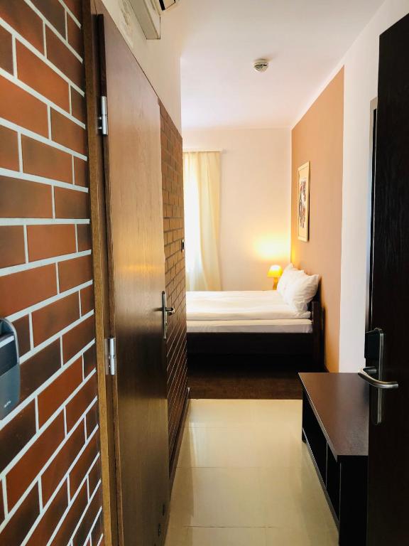 Кровать или кровати в номере Hotel Olecki