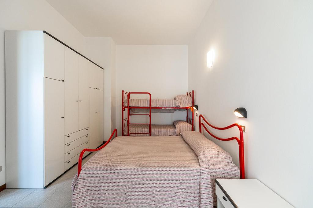 A bed or beds in a room at Residenza Casa del Sole