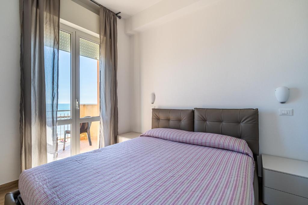 A bed or beds in a room at Residenza Casa del Sole