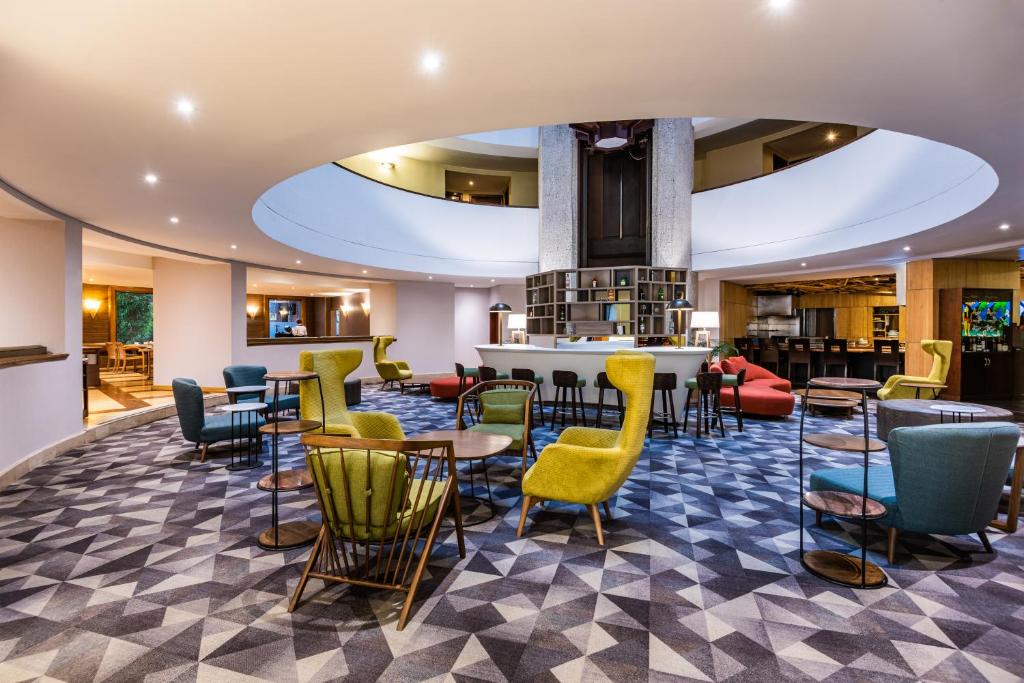 Posezení v ubytování Cosmos 100 Hotel & Centro de Convenciones - Hoteles Cosmos