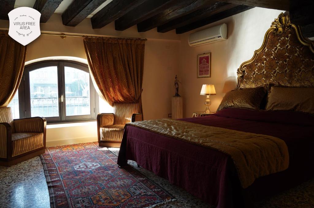 Posteľ alebo postele v izbe v ubytovaní Granda Sweet Suites