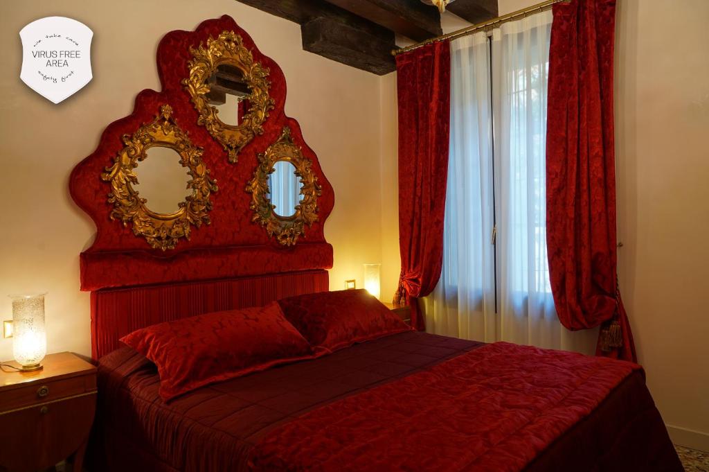 Posteľ alebo postele v izbe v ubytovaní Granda Sweet Suites