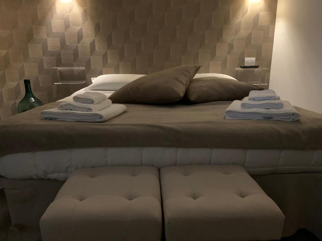מיטה או מיטות בחדר ב-Cappellanio Suite & Apartament