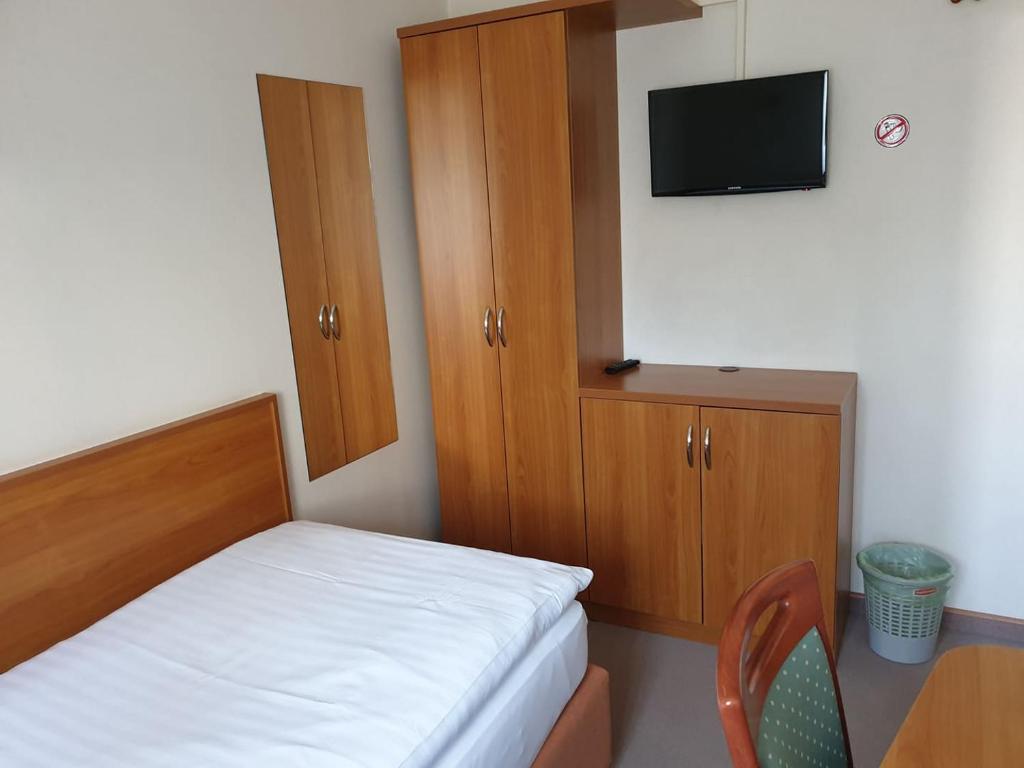 Postel nebo postele na pokoji v ubytování Dežman Apartments & Rooms