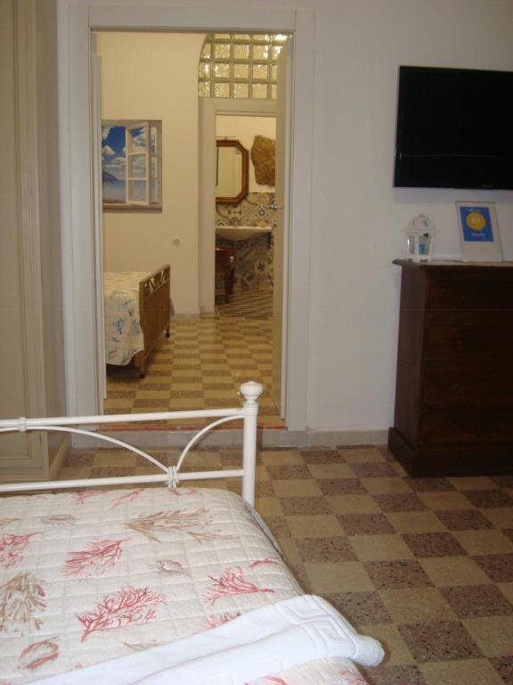 Posteľ alebo postele v izbe v ubytovaní In Vacanza a Gaeta - L'Elica
