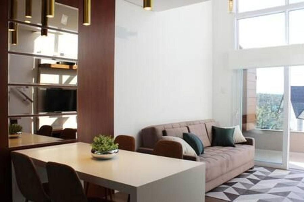 LOFT GRAMADO 306 - 1 SUÍTE (5 PAX) JUNTO À RUA COBERTA!  LOFT GRAMADO 306 - 1 SUÍTE (5 PAX) JUNTO À RUA COBERTA!