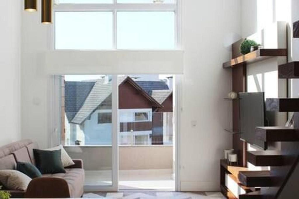 LOFT GRAMADO 306 - 1 SUÍTE (5 PAX) JUNTO À RUA COBERTA!  LOFT GRAMADO 306 - 1 SUÍTE (5 PAX) JUNTO À RUA COBERTA!