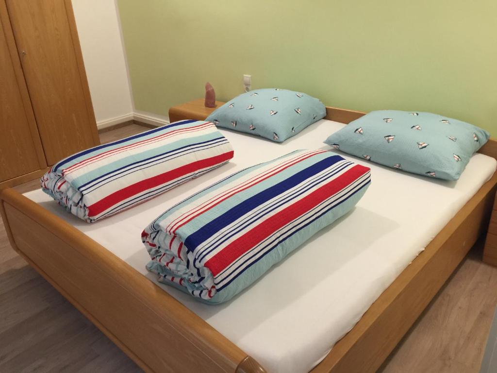 Postel nebo postele na pokoji v ubytování Gästezimmer Hozici