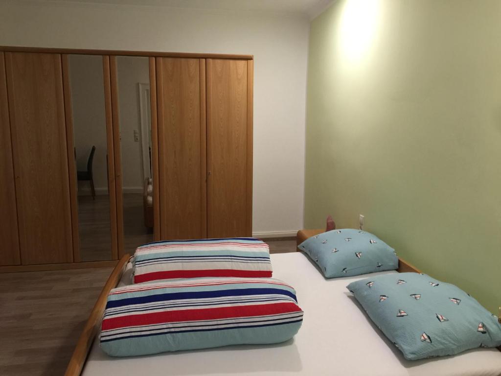 Postel nebo postele na pokoji v ubytování Gästezimmer Hozici
