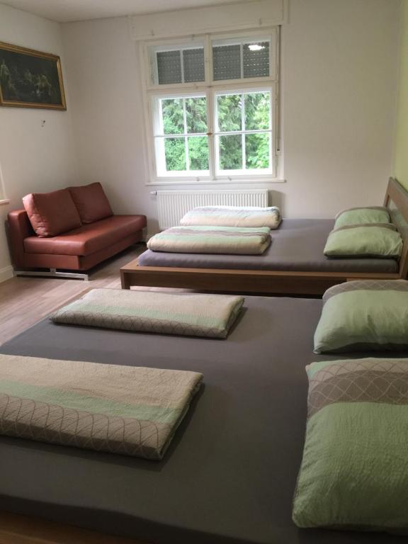 Postel nebo postele na pokoji v ubytování Gästezimmer Hozici