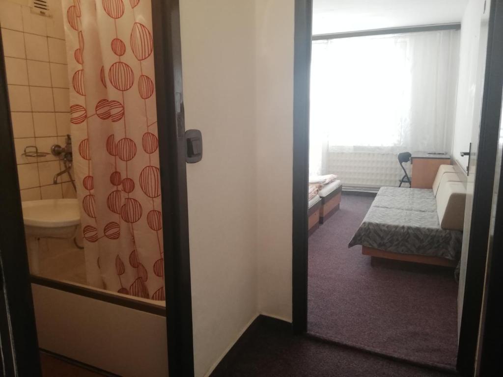 Postel nebo postele na pokoji v ubytování ABC Hotel Nitra