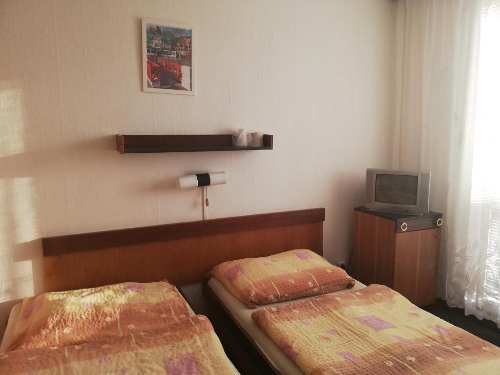Postel nebo postele na pokoji v ubytování ABC Hotel Nitra