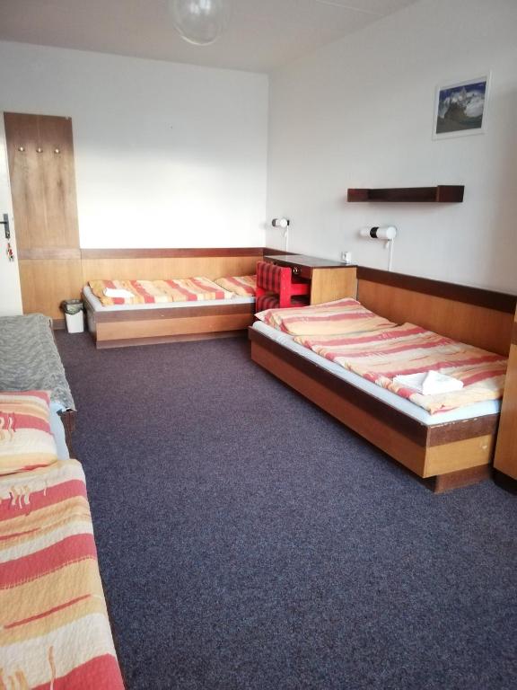 Postel nebo postele na pokoji v ubytování ABC Hotel Nitra