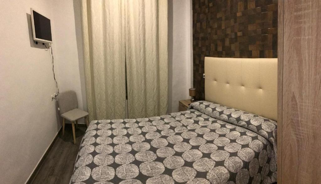 Cama o camas de una habitación en Casa Marta