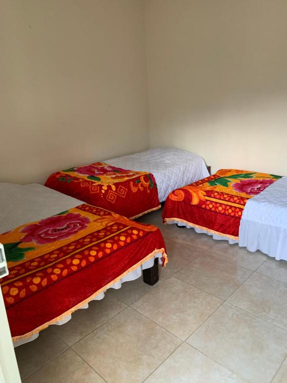 Postel nebo postele na pokoji v ubytování Hotel Maxim