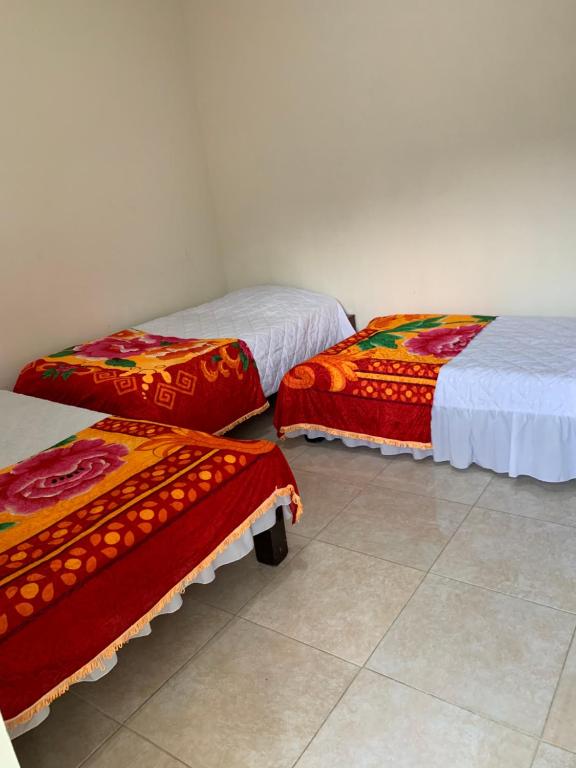 Postel nebo postele na pokoji v ubytování Hotel Maxim