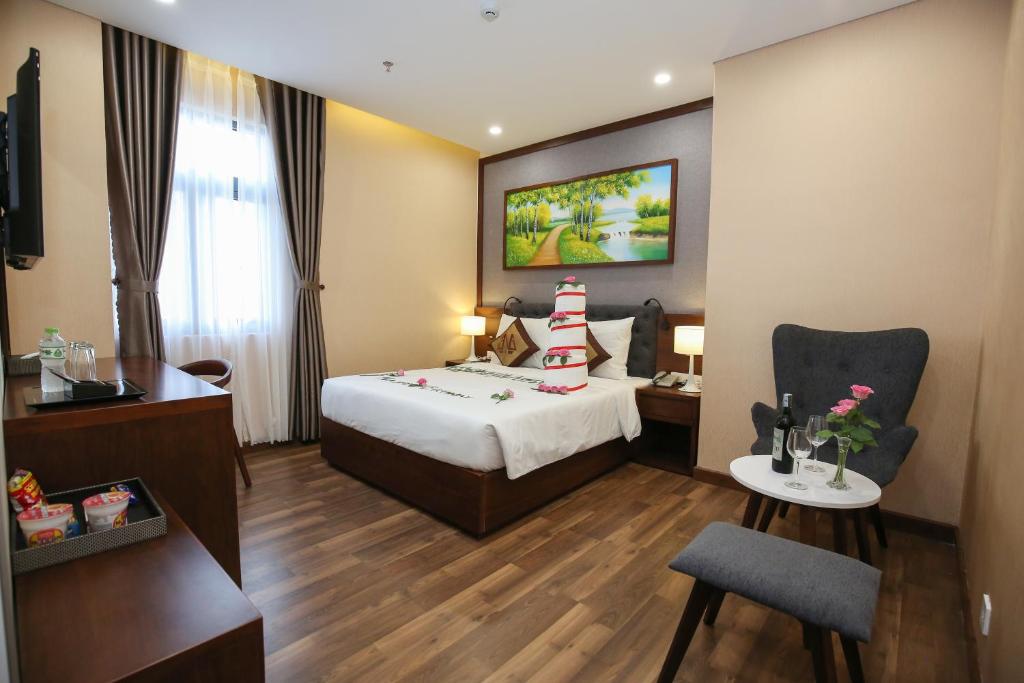 Postel nebo postele na pokoji v ubytování Nagila Boutique Hotel