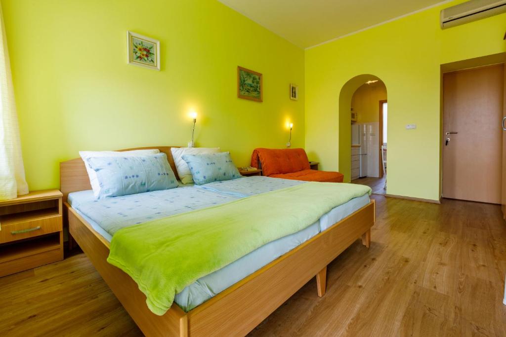 Postel nebo postele na pokoji v ubytování Apartments Seaside