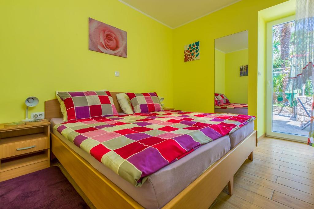 Postel nebo postele na pokoji v ubytování Apartments Seaside
