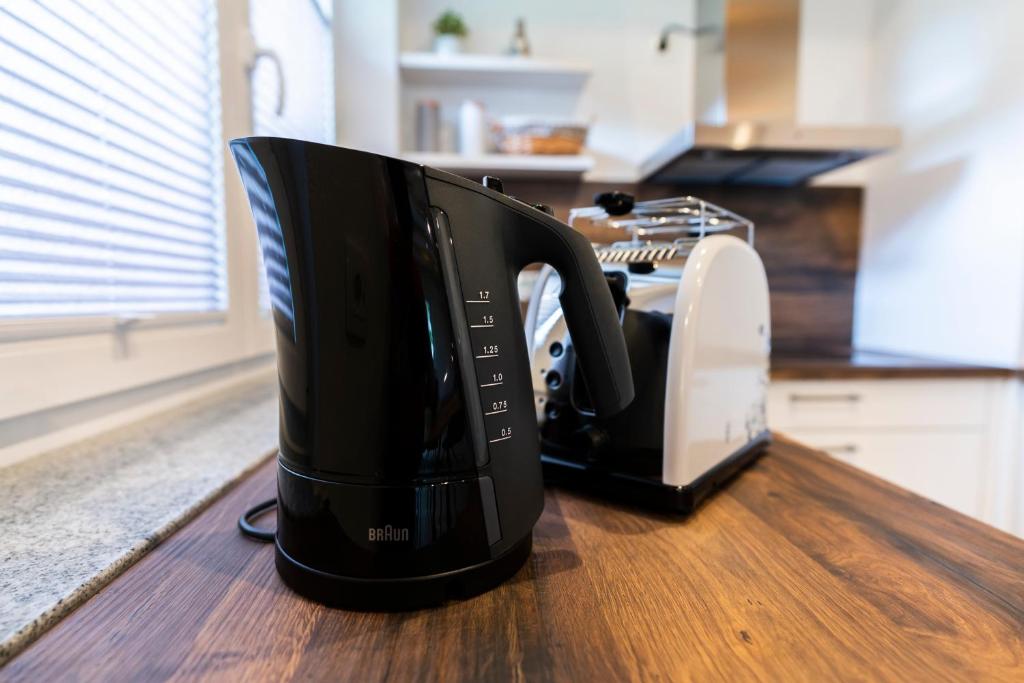 Kuchyň nebo kuchyňský kout v ubytování Apartmaji MM