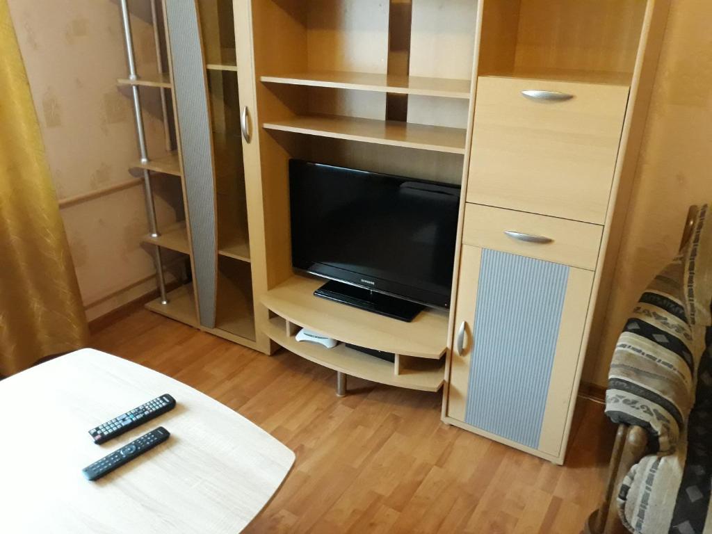 A television and/or entertainment centre at City Centre Apartaments