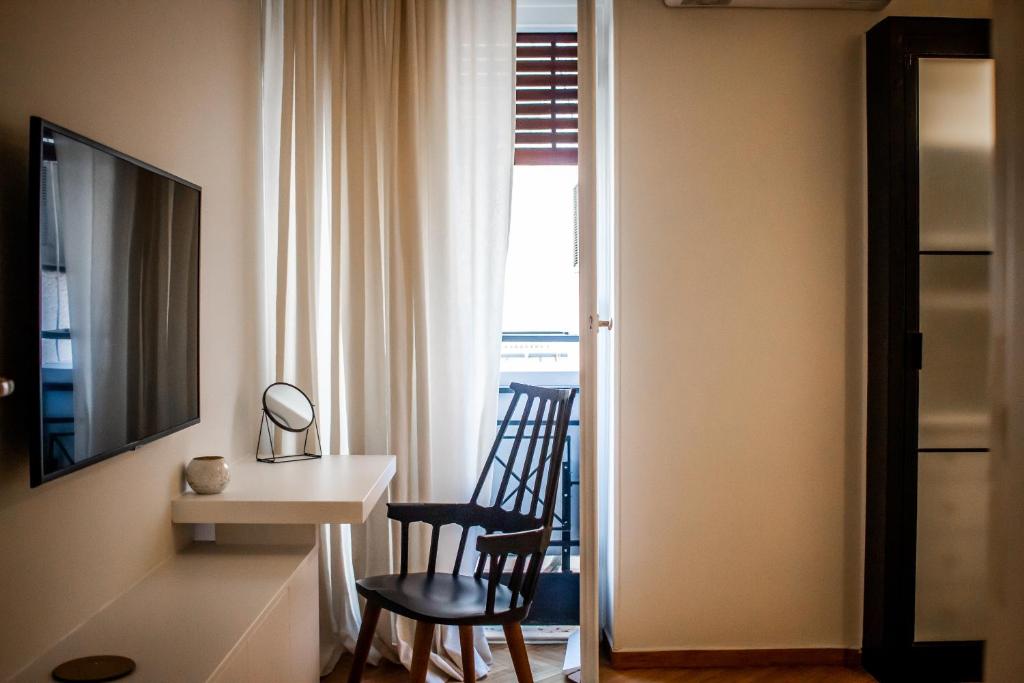 Televízia a/alebo spoločenská miestnosť v ubytovaní API Projects Athens - Cartier Apartment