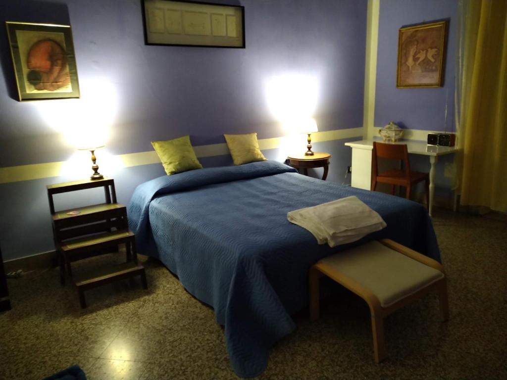 Postel nebo postele na pokoji v ubytování Il Genio del Porto - Mabbonath b&b