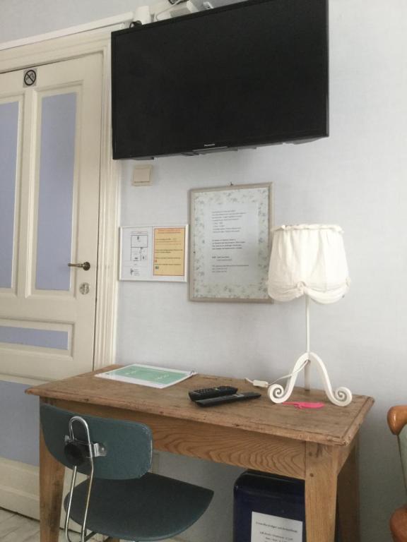 TV a/nebo společenská místnost v ubytování B&B-Fine Fleur