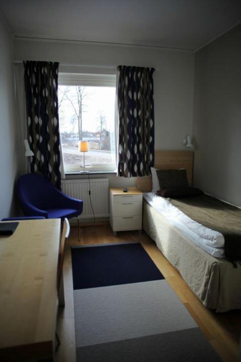 Postel nebo postele na pokoji v ubytování Hotell Åsen