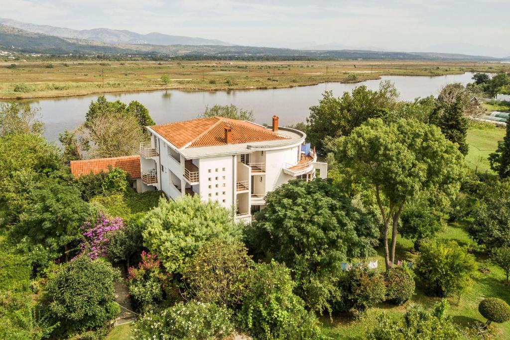 an aerial view of a house with a river at Casa Agata in Ulcinj