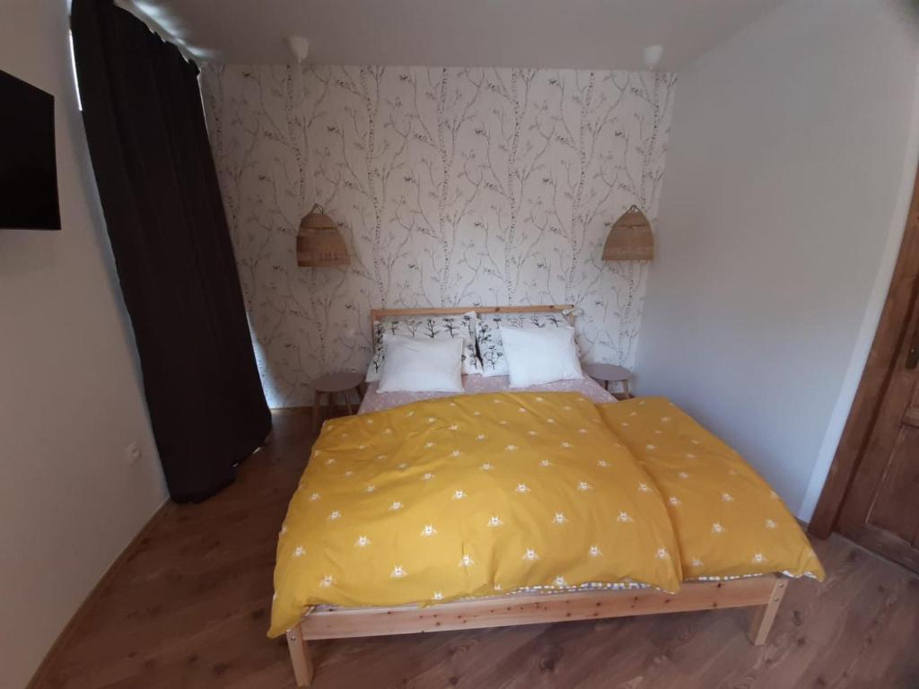 Postel nebo postele na pokoji v ubytování Apartmány AMADE Jeseníky