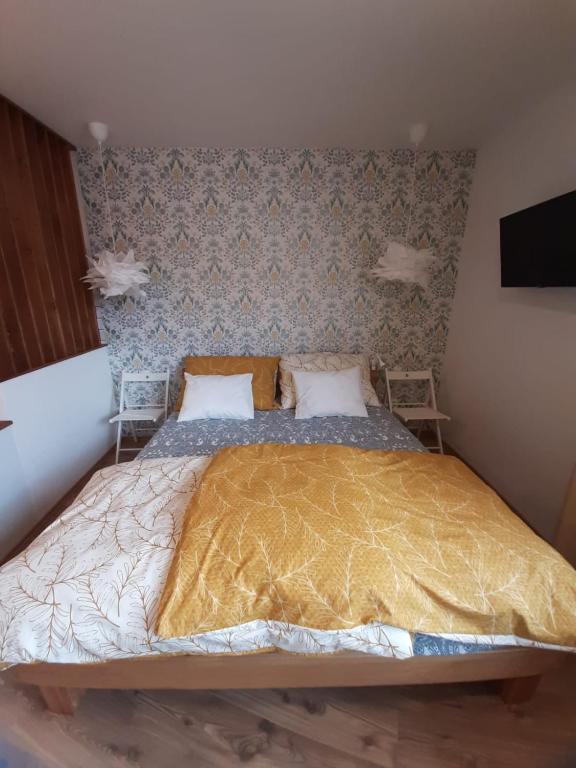 Postel nebo postele na pokoji v ubytování Apartmány AMADE Jeseníky