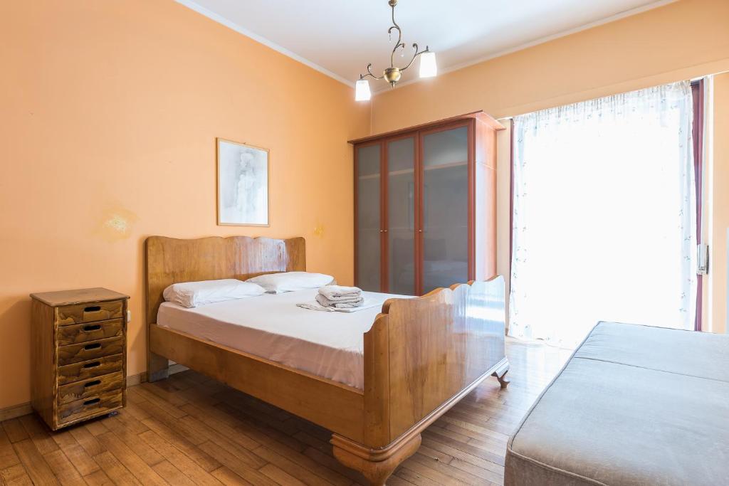 Łóżko lub łóżka w pokoju w obiekcie Victoria Star Apartments