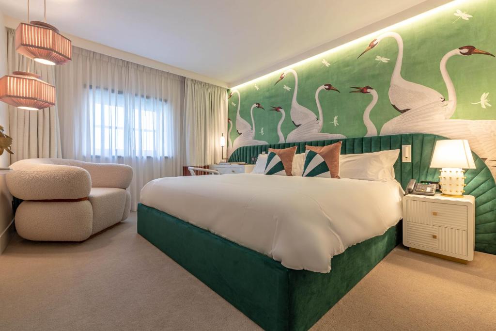 Postel nebo postele na pokoji v ubytování Hotel Claude Marbella