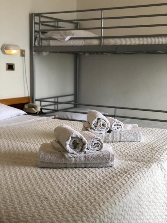 Postel nebo postele na pokoji v ubytování Hotel Artide