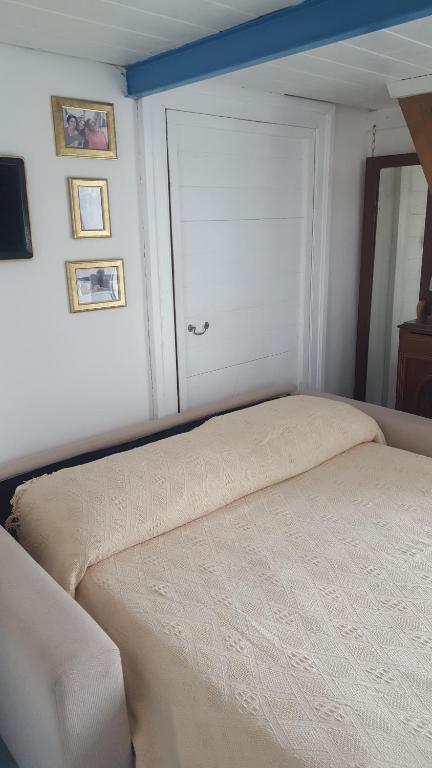 Postel nebo postele na pokoji v ubytování La Casa Sugli Archi