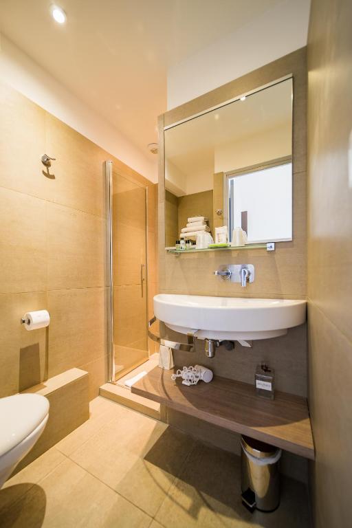 Koupelna v ubytování Hôtel Le Rabelais