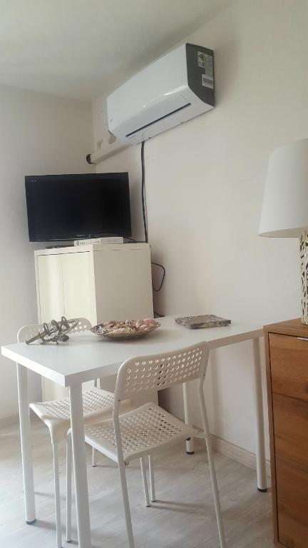 TV a/nebo společenská místnost v ubytování La Casa Sugli Archi