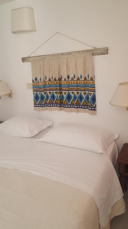 Postel nebo postele na pokoji v ubytování La Casa Sugli Archi