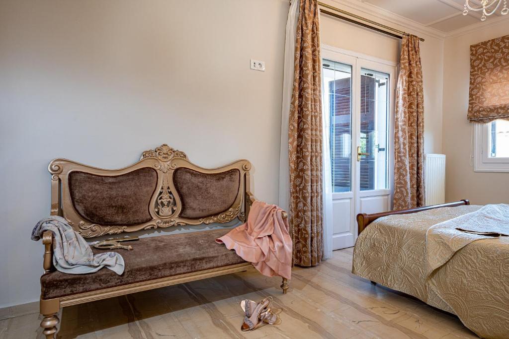 Posteľ alebo postele v izbe v ubytovaní Aigli Villa