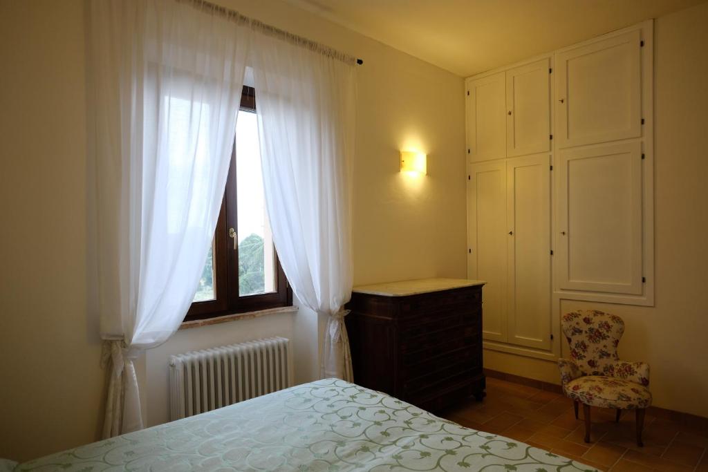 Łóżko lub łóżka w pokoju w obiekcie Agriturismo Vigna Sul Lago