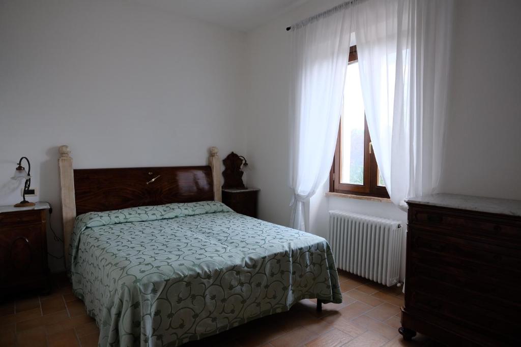 Łóżko lub łóżka w pokoju w obiekcie Agriturismo Vigna Sul Lago