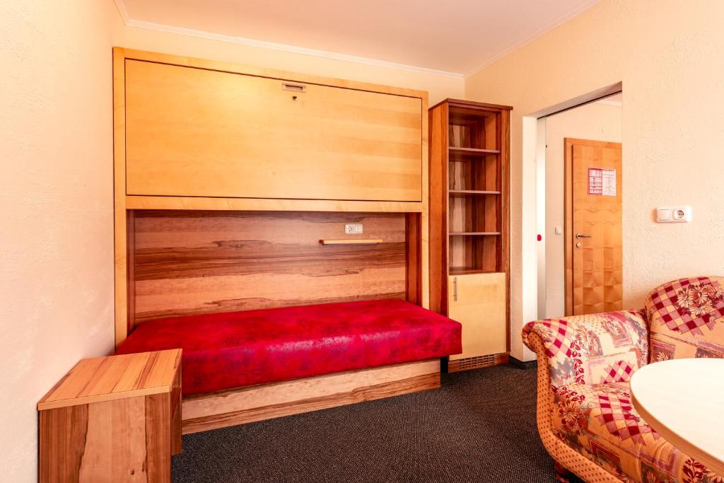 Posteľ alebo postele v izbe v ubytovaní Panorama Hotel Traunstein
