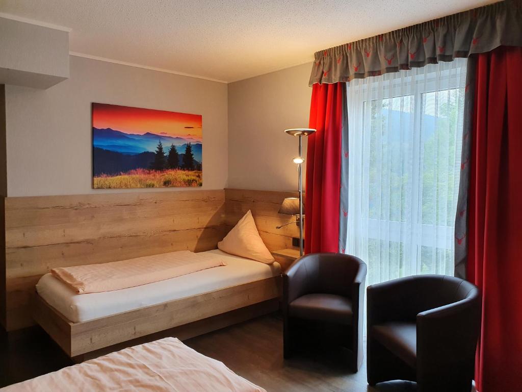 Postel nebo postele na pokoji v ubytování Hotel Bigger Hof - Wirtshaus Platzhirsch am Jahnplatz