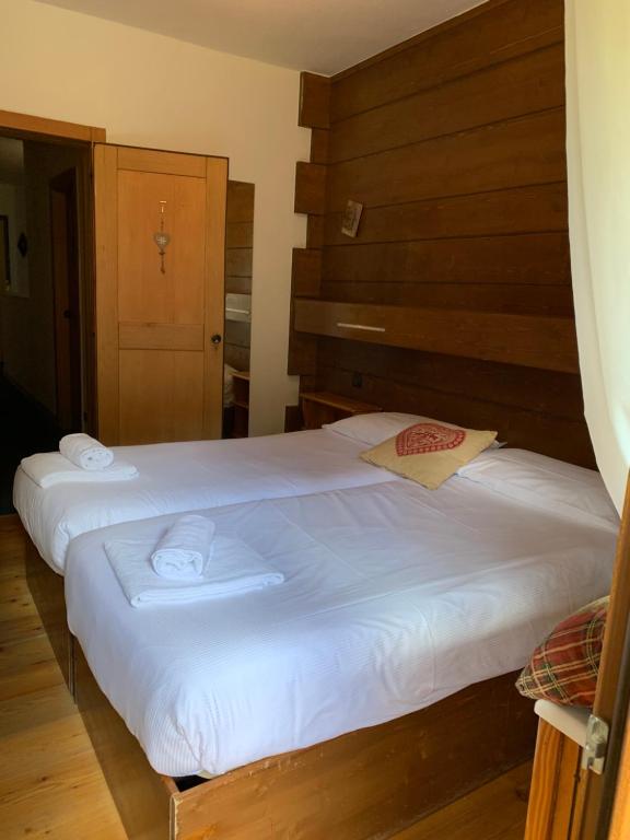 Postel nebo postele na pokoji v ubytování Hotel Capriolo