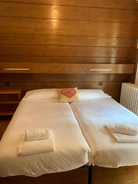 Postel nebo postele na pokoji v ubytování Hotel Capriolo