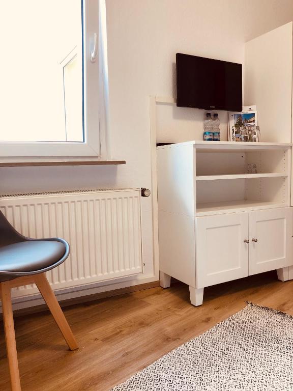 TV a/nebo společenská místnost v ubytování Gasthaus Stammbaum