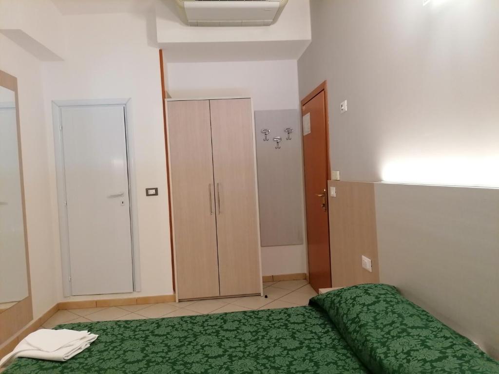 Postel nebo postele na pokoji v ubytování HOTEL ANDREA'S