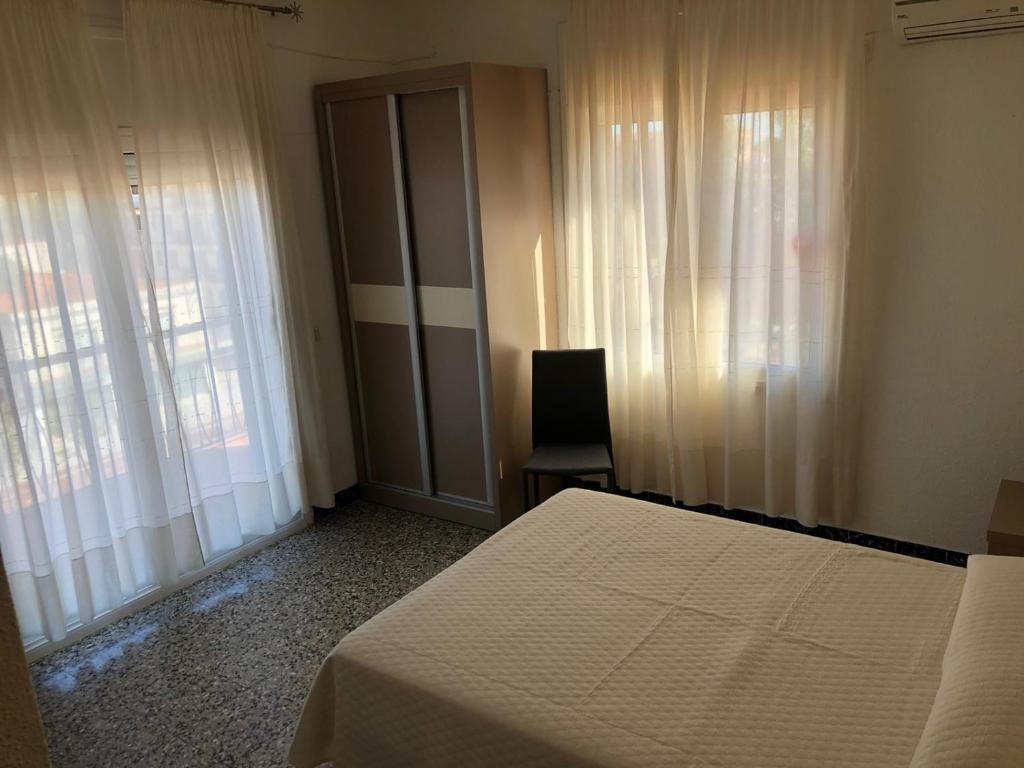 Posteľ alebo postele v izbe v ubytovaní Hostal Internacional