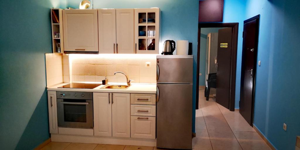 Kuchyň nebo kuchyňský kout v ubytování Apartment Oazis
